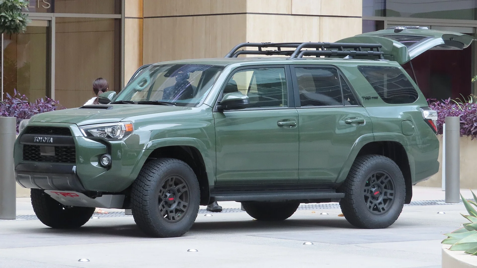 Toyota 4Runner TRD Pro — an army-green 2020 4Runner, front and side three-quarter view showing its off-road stance and ground clearance