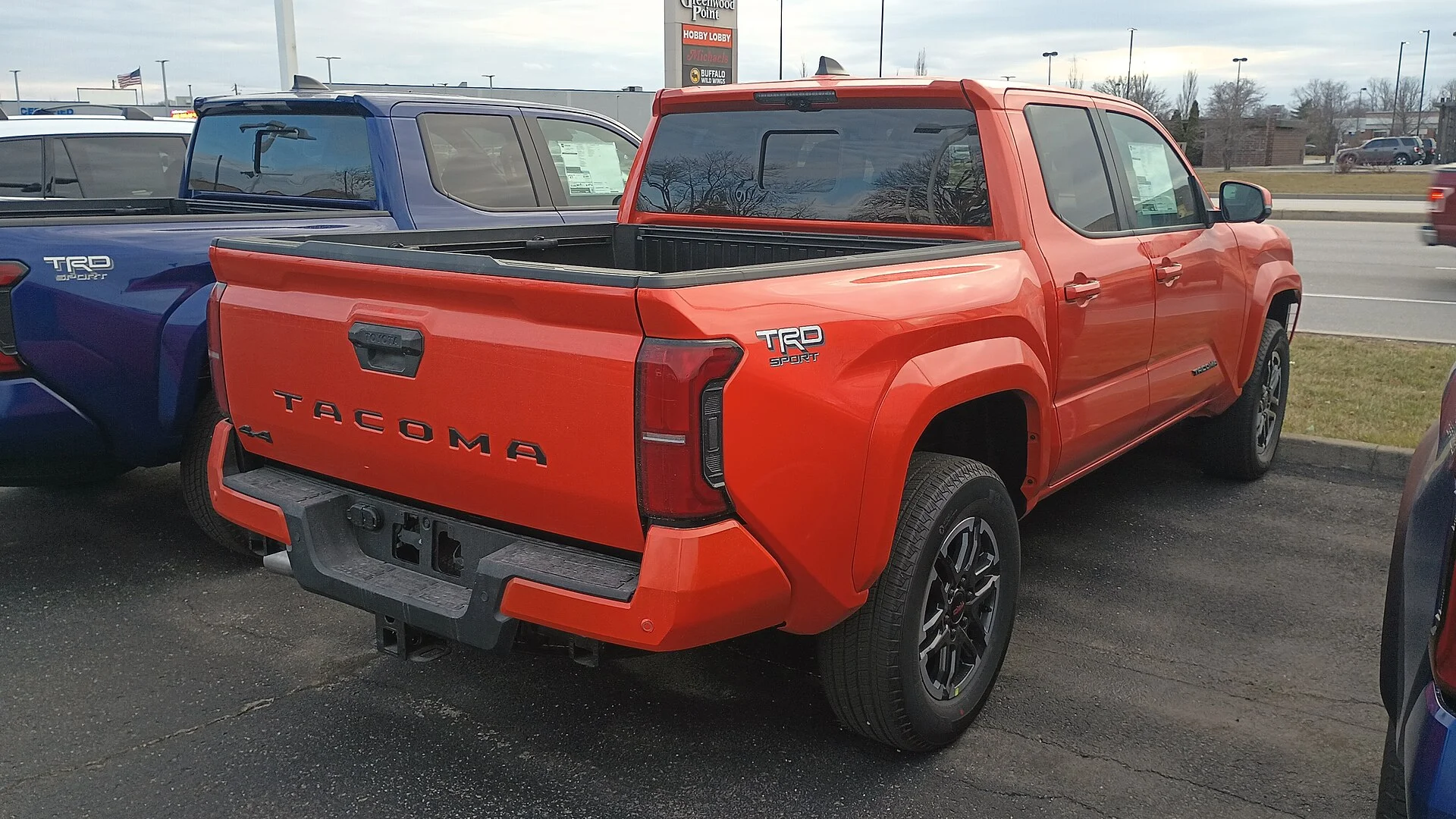 Toyota Tacoma TRD Sport — a 2024 Tacoma, rear view showing the bed