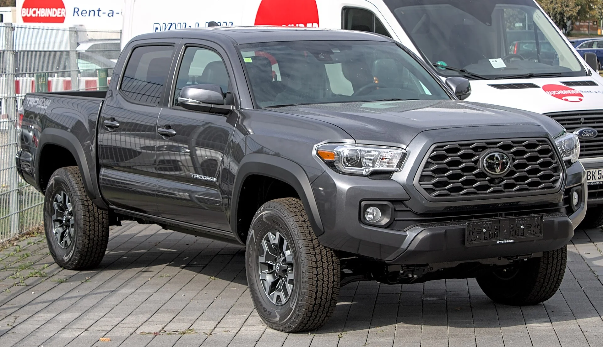 Toyota Tacoma TRD — a grey Tacoma, front and side three-quarter view