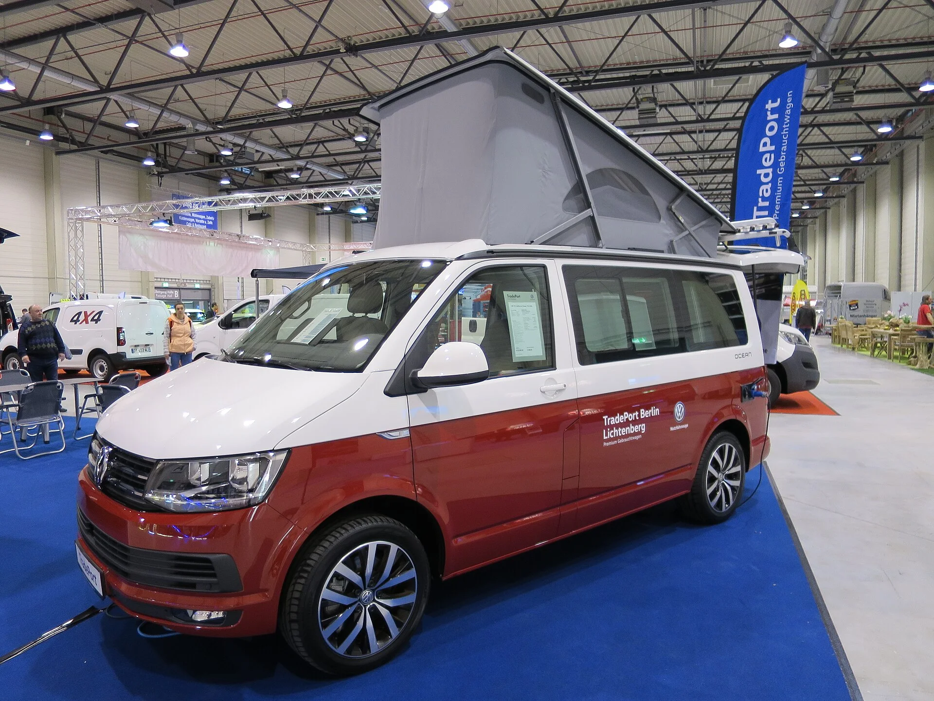 A Volkswagen California (T6 generation) with its pop-top roof raised, the layout that defines the California camper