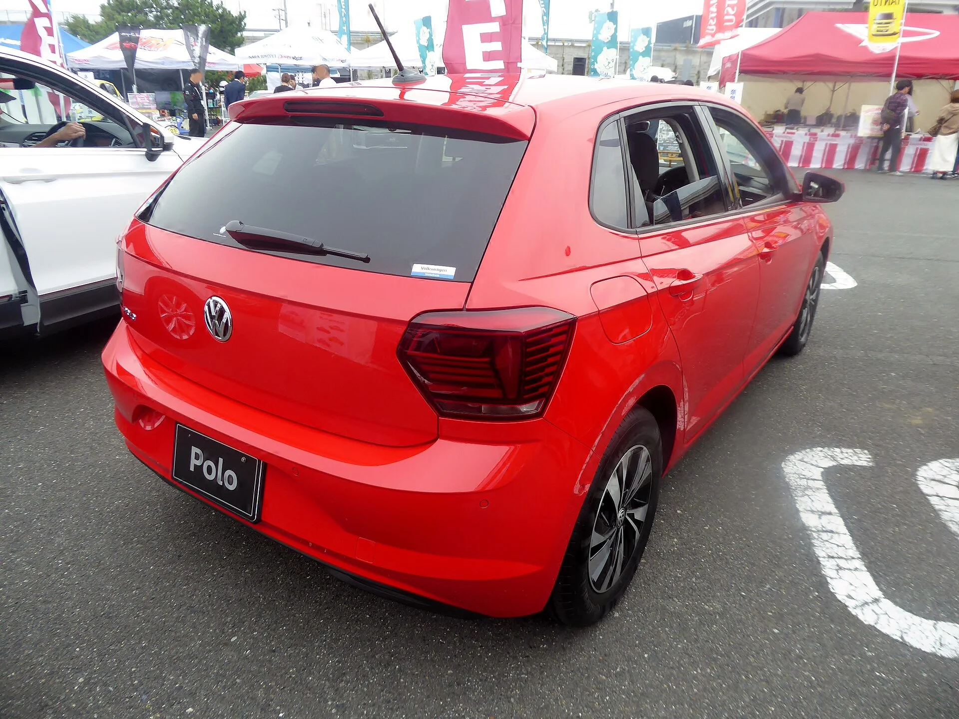 A Volkswagen Polo hatchback (rear view), the compact car this camping setup guide is built around.