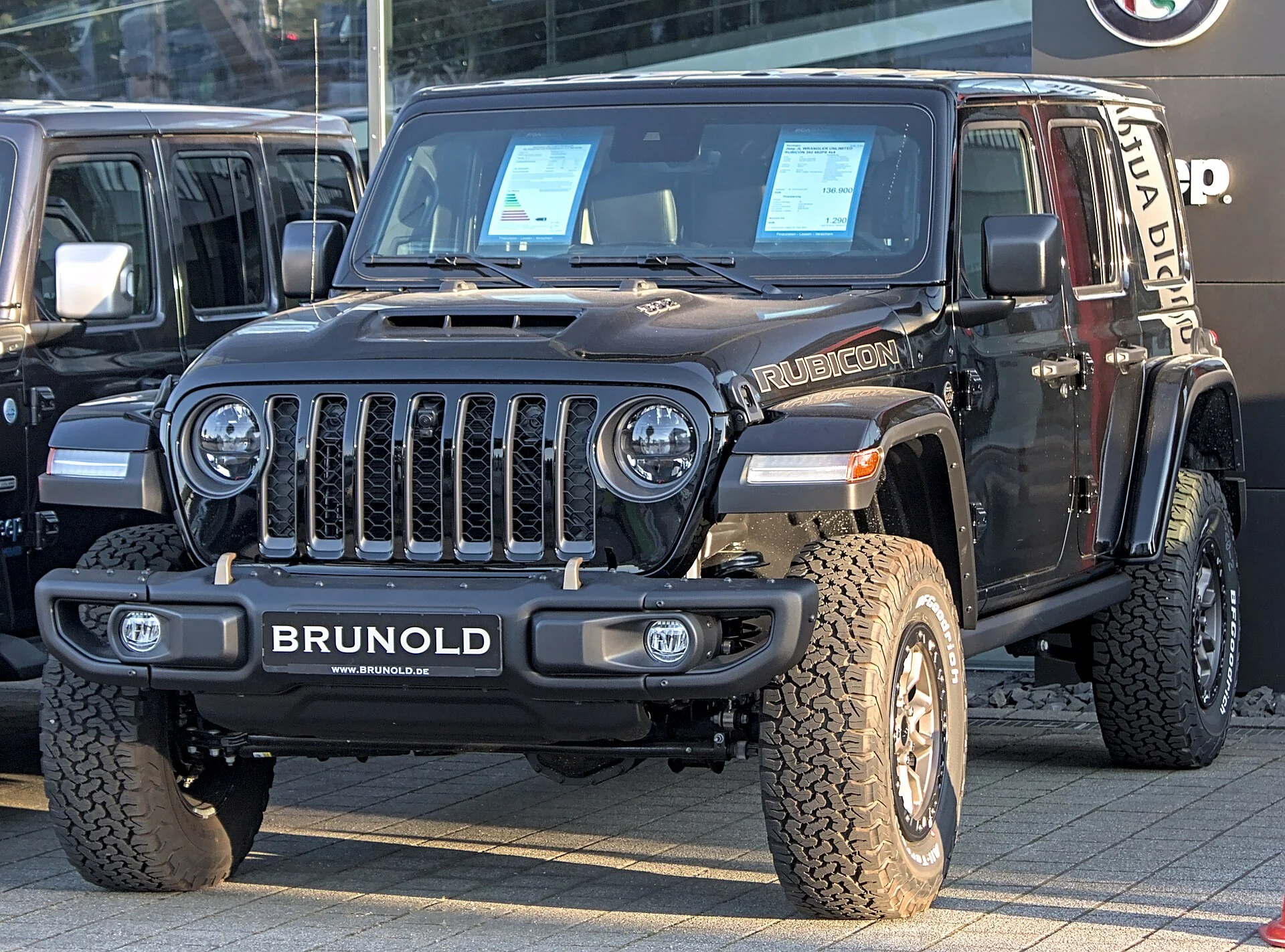Black Jeep Wrangler Rubicon, front three-quarter view with hardtop