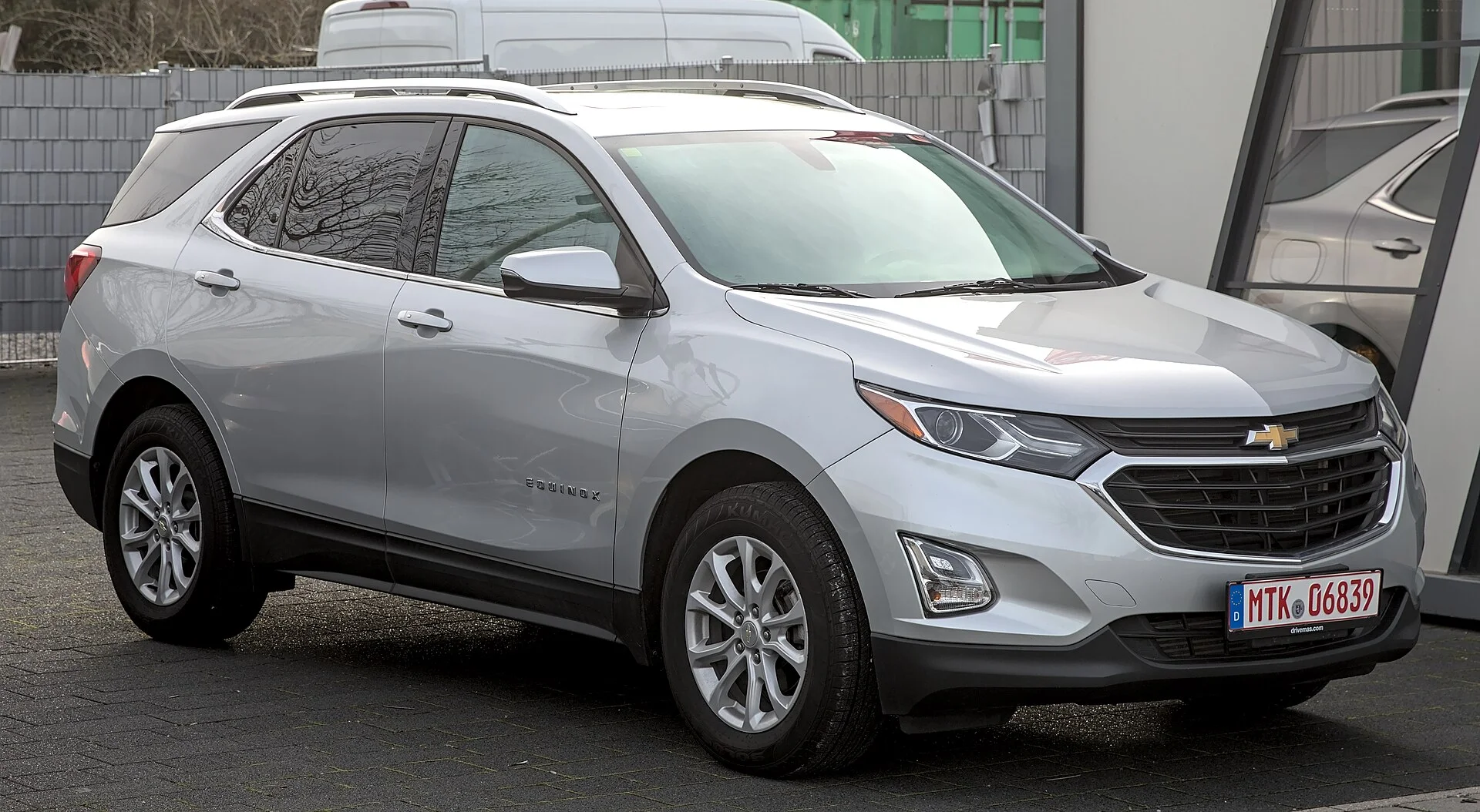 Silver Chevy Equinox, current generation, front three-quarter view