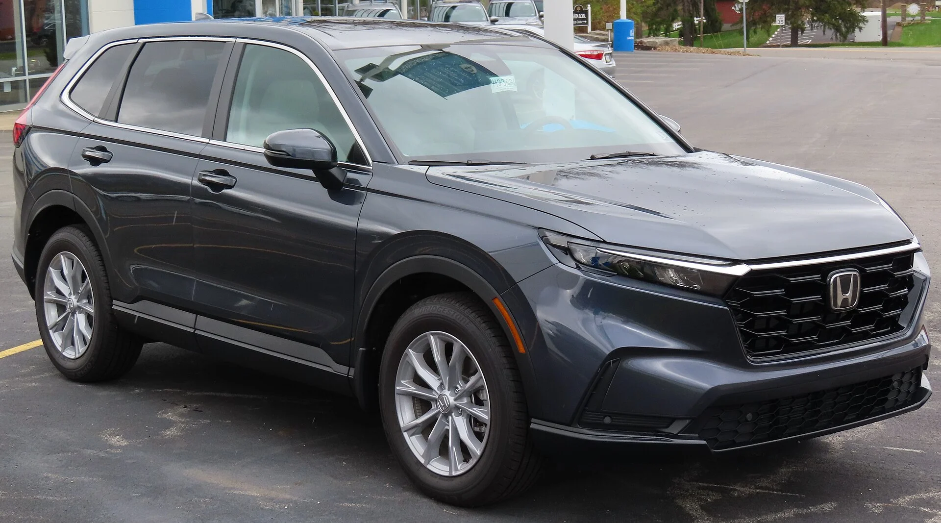 A grey Honda CR-V, a compact camping crossover
