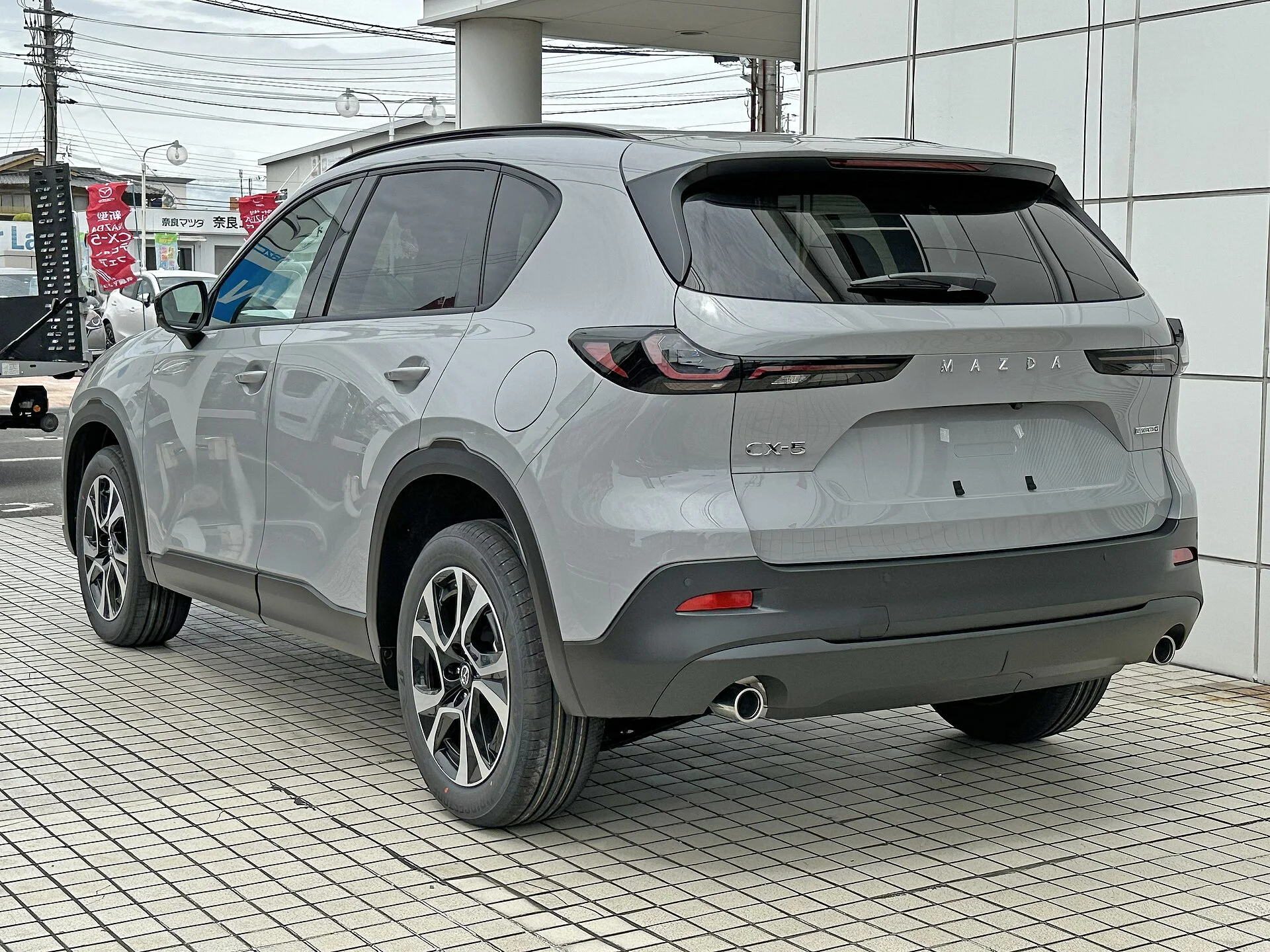 Silver Mazda CX-5, current generation, rear three-quarter view