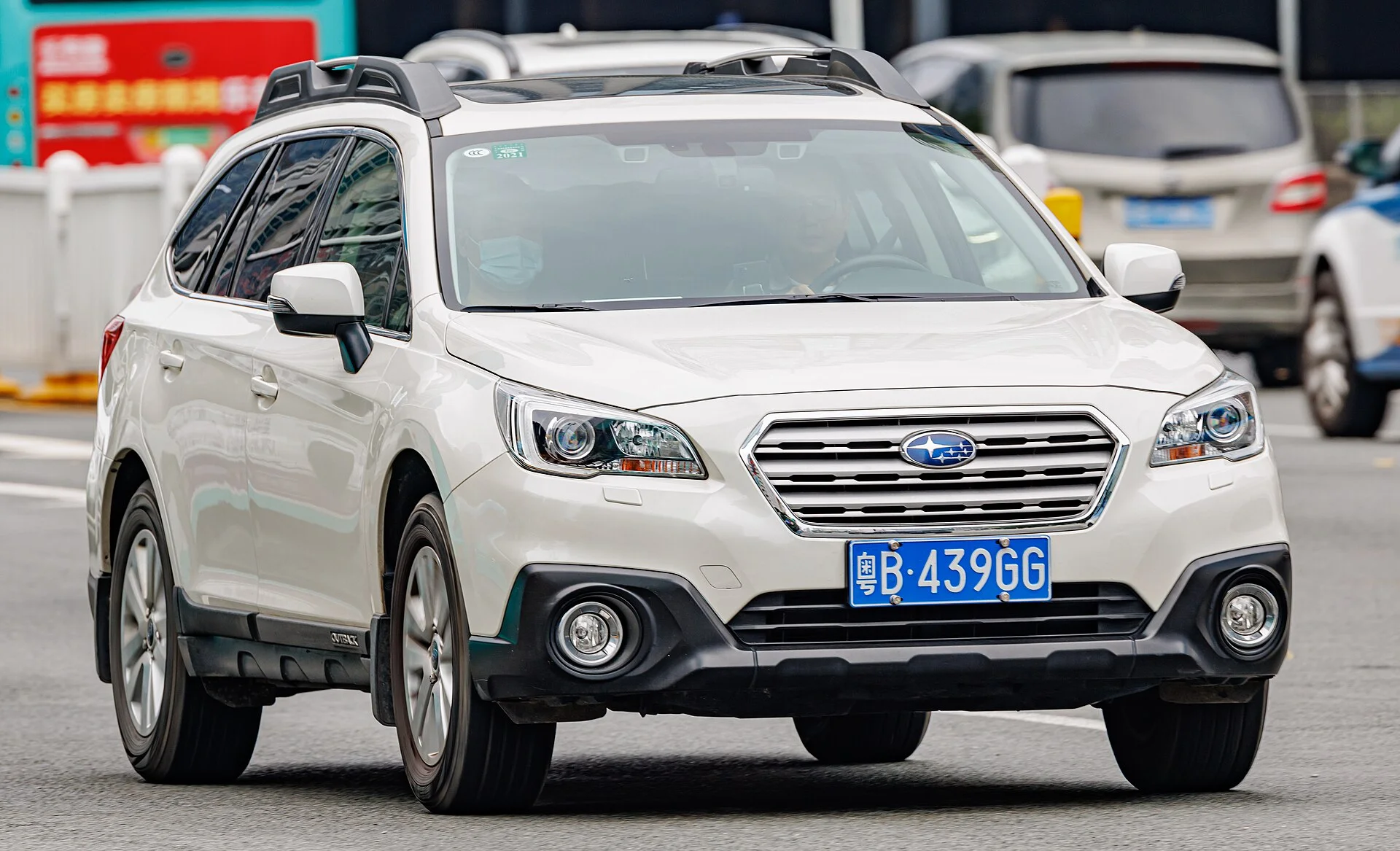 Subaru Outback (5th generation) in white, front three-quarter view