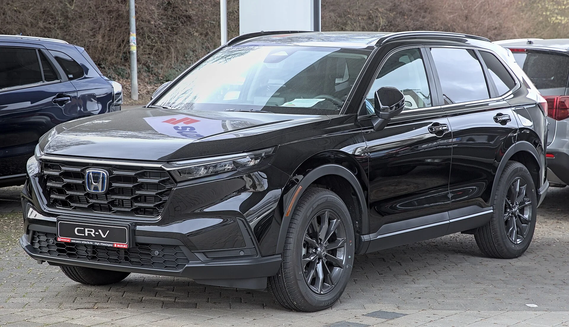 Honda CR-V (6th generation) in black, front three-quarter view