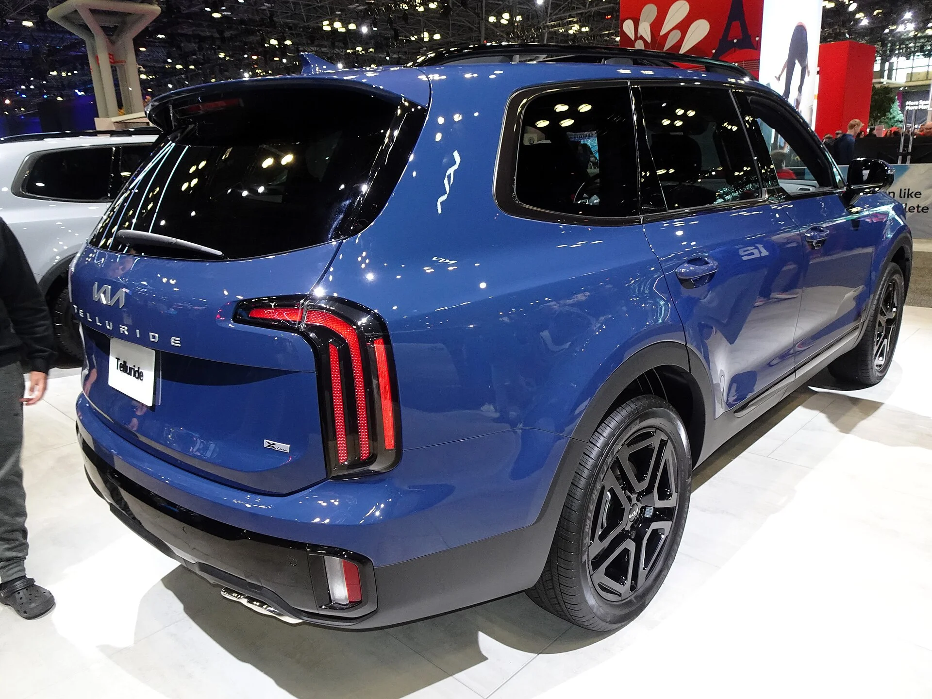 Blue Kia Telluride SX-Prestige, rear three-quarter view