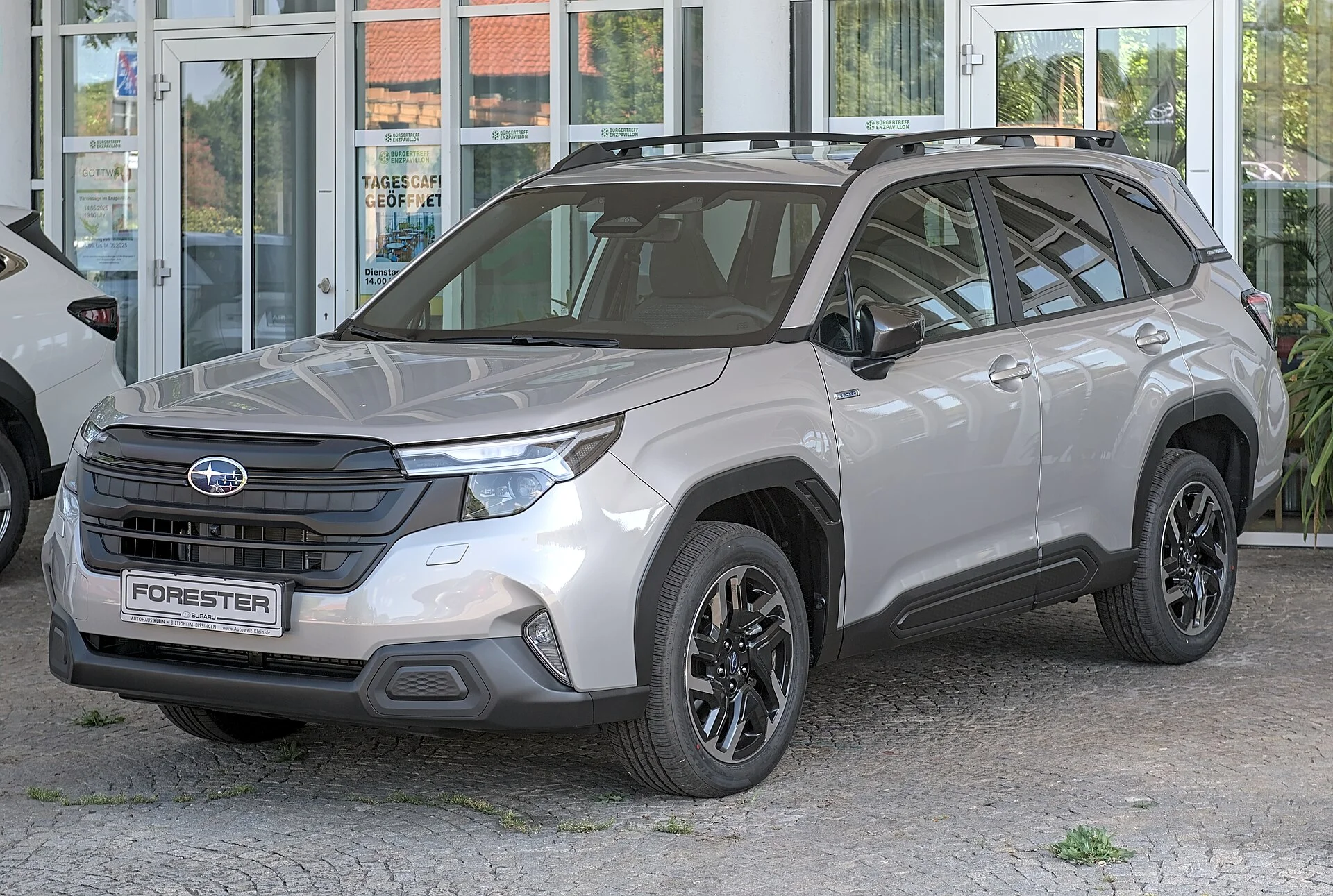 Silver Subaru Forester, current generation, front three-quarter view