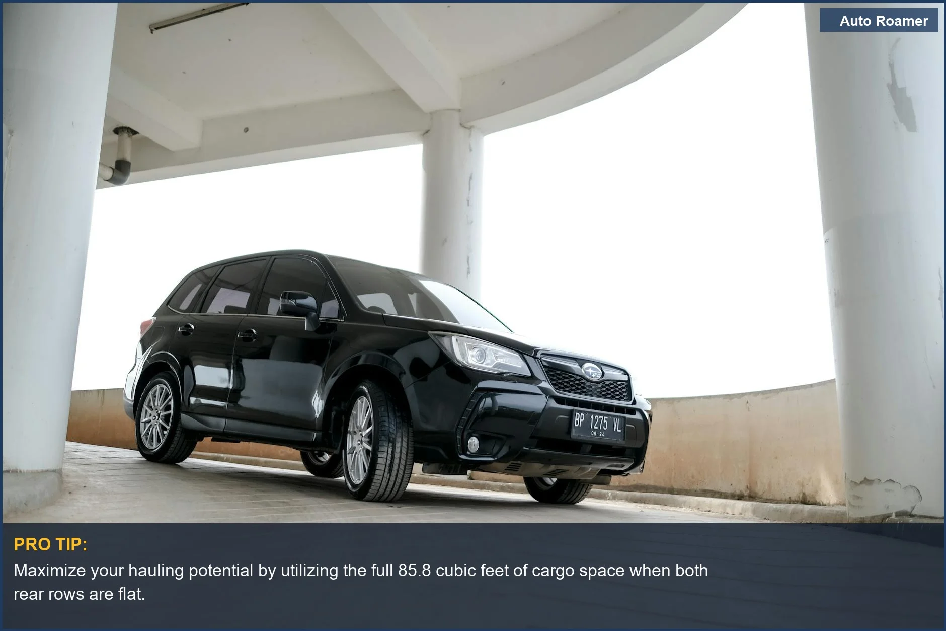 Sleek black 2026 Ford Explorer interior showing spacious cargo area with seats folded down, highlighting ample specifications.
