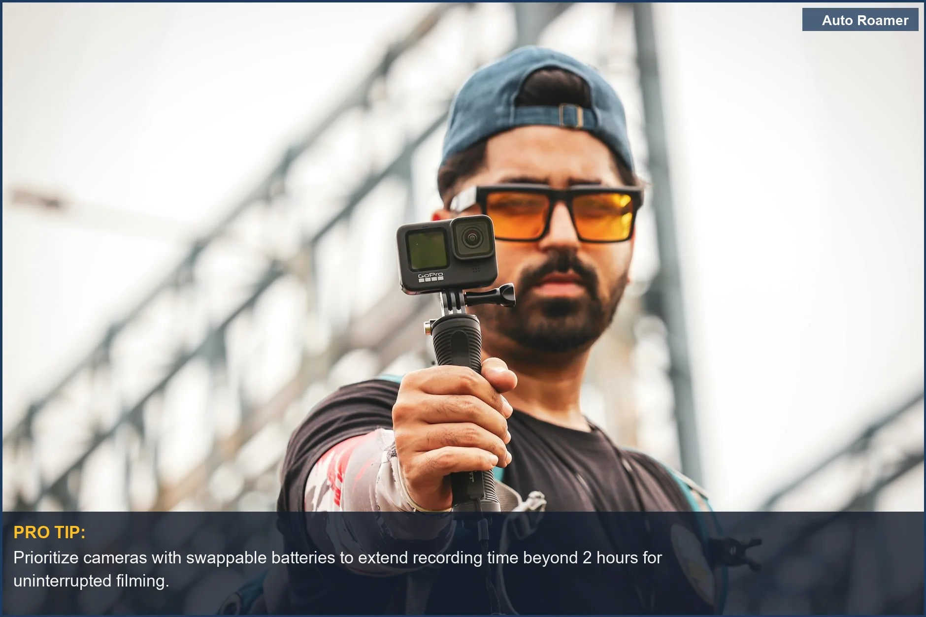 Asian man using a GoPro action camera for long recording sessions outdoors, capturing his adventure.