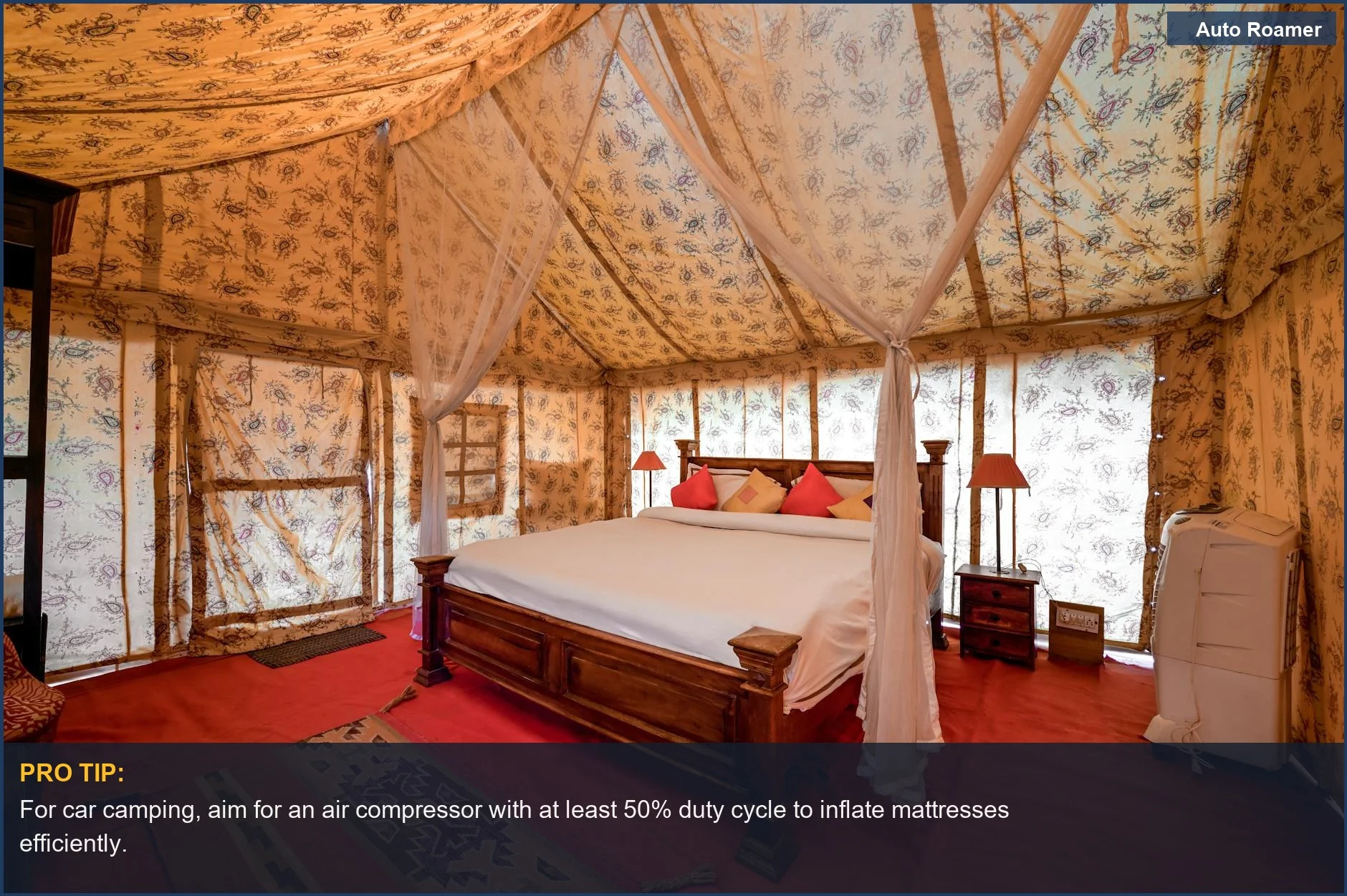 Luxury tent interior with a comfortable bed, illustrating the ideal car camping setup for extended comfort.