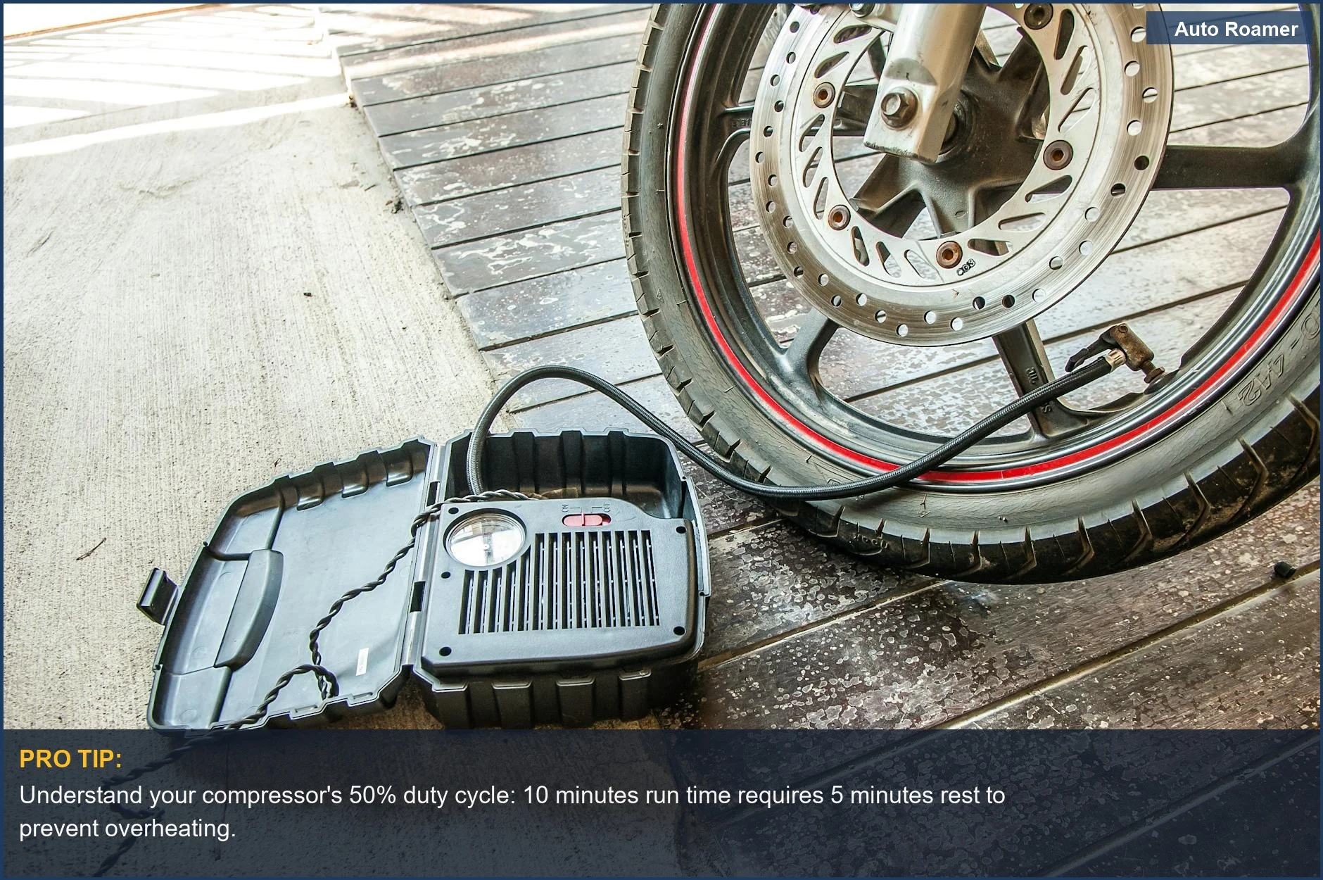 Man uses portable air compressor duty cycle on motorcycle tire, essential overlanding equipment for quick inflations.