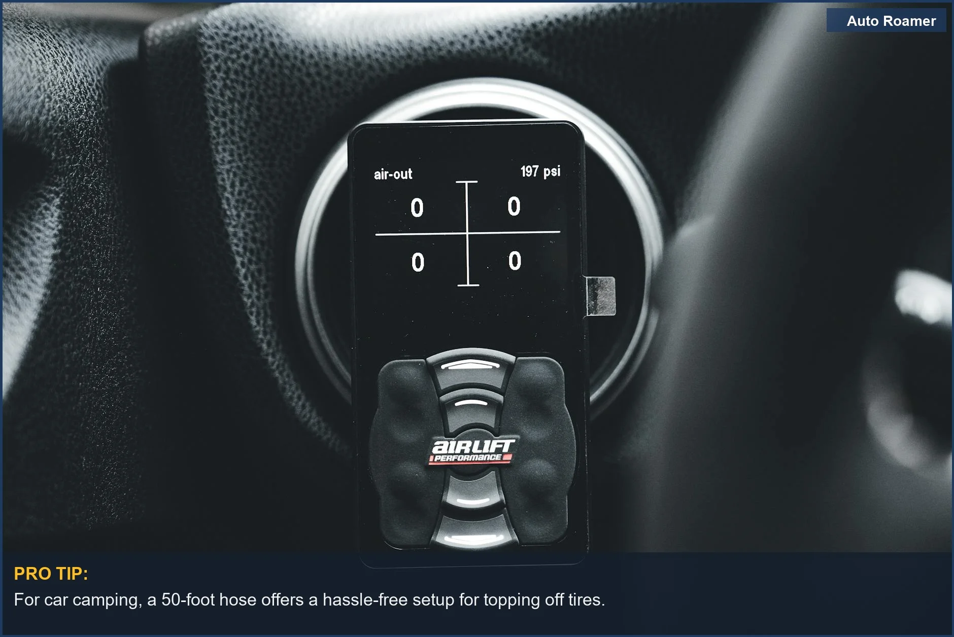 Close-up of an Airlift performance controller in a car interior, showing pressure settings for tires.
