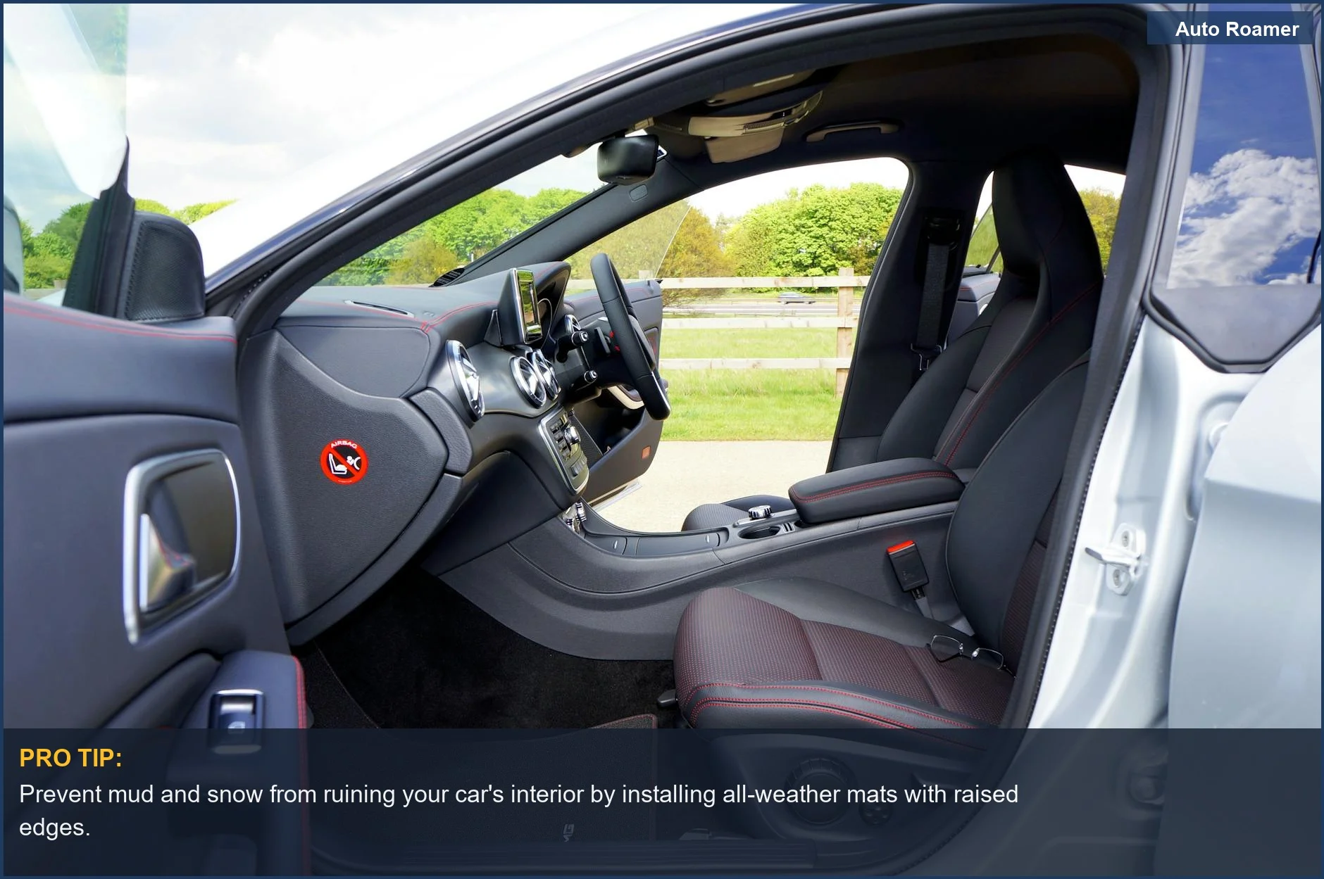 Modern car interior with leather seats and advanced dashboard, highlighting the benefits of winter car mats.