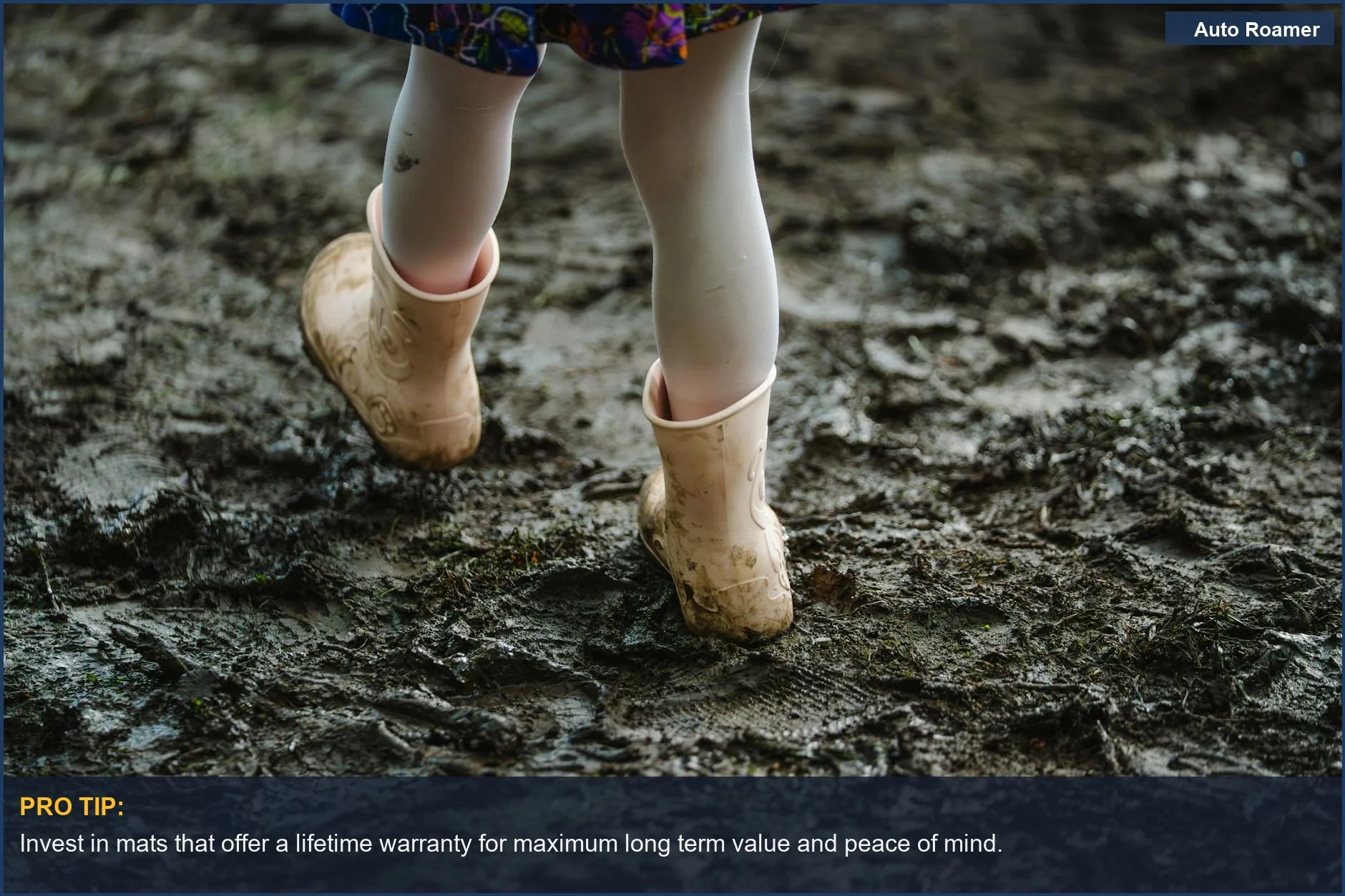 Child in pink rubber boots walks through mud, showcasing long term value of car mats.