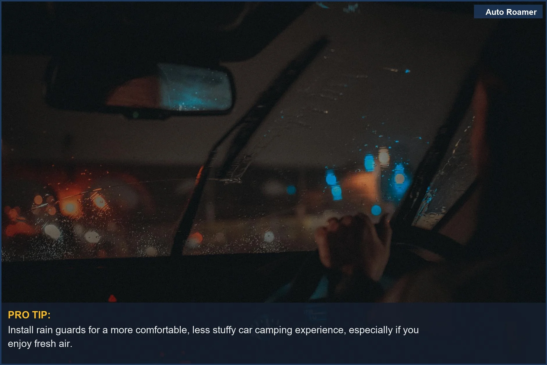 Moody night drive with neon lights reflecting on a wet windshield, considering the necessity of car camping rain guards.