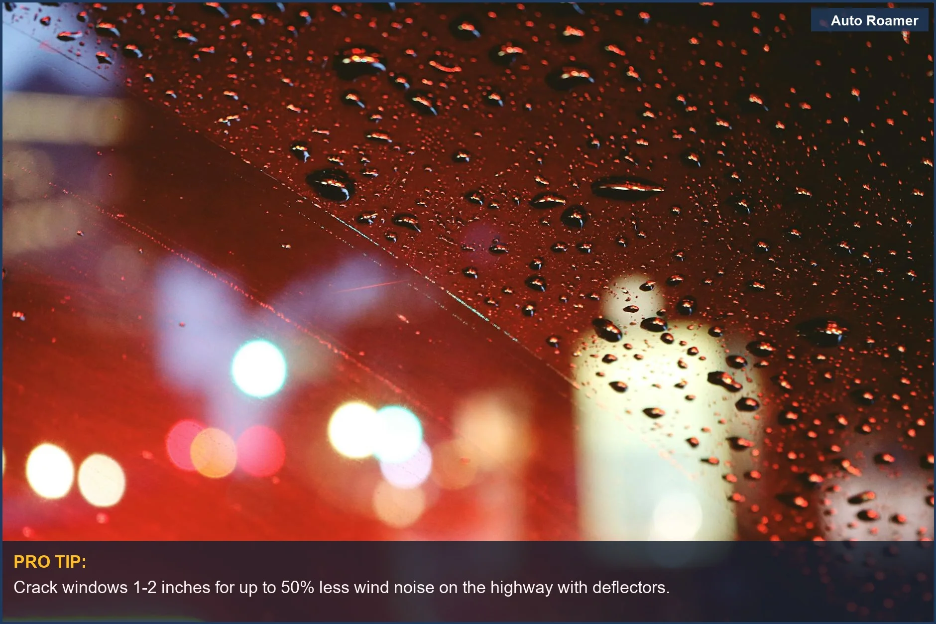 Raindrops on car window at night, blurring city lights, suggesting car camping rain guards' impact on wind noise.