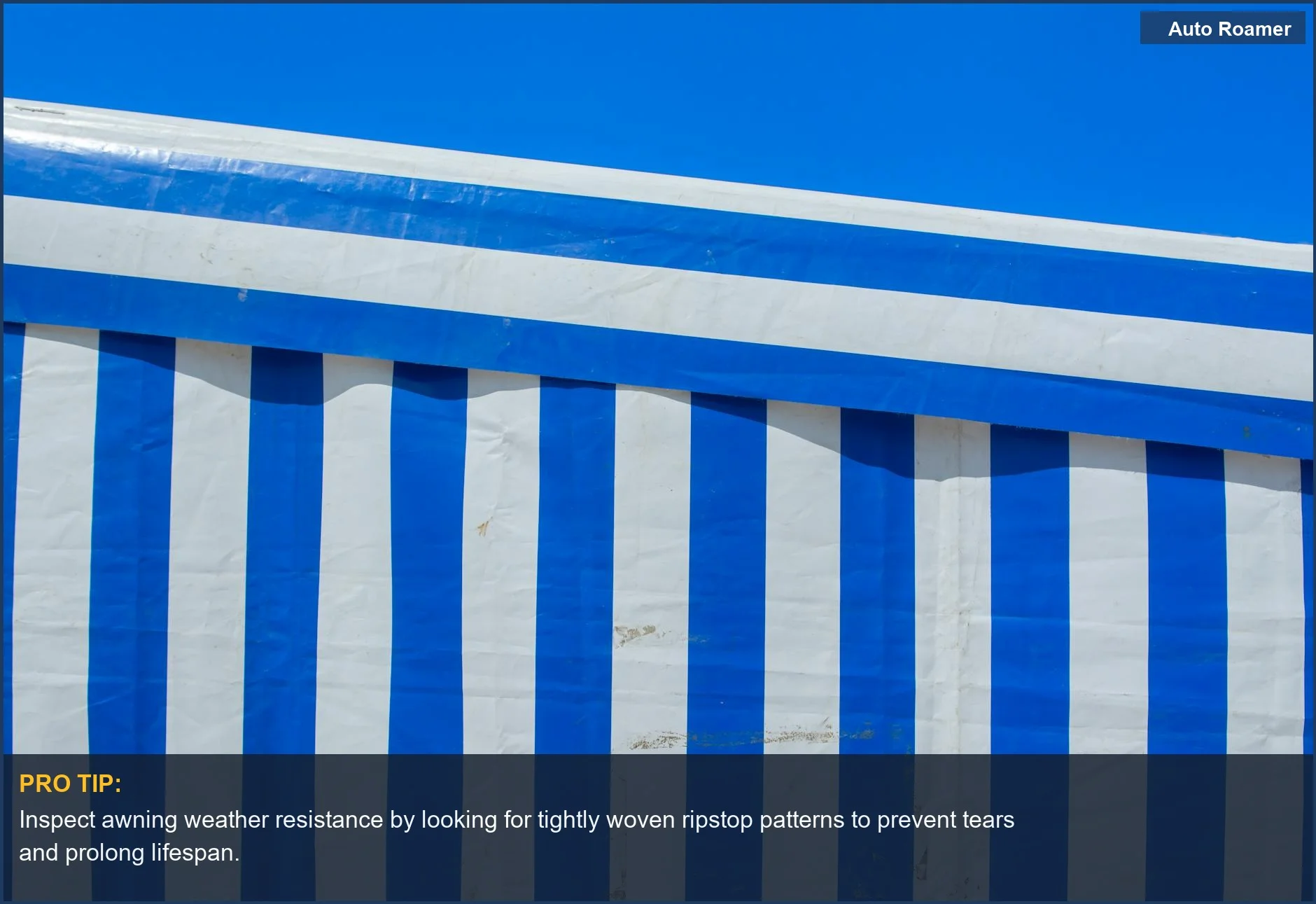 Detailed view of ripstop canvas awning material with vivid blue and white stripes.