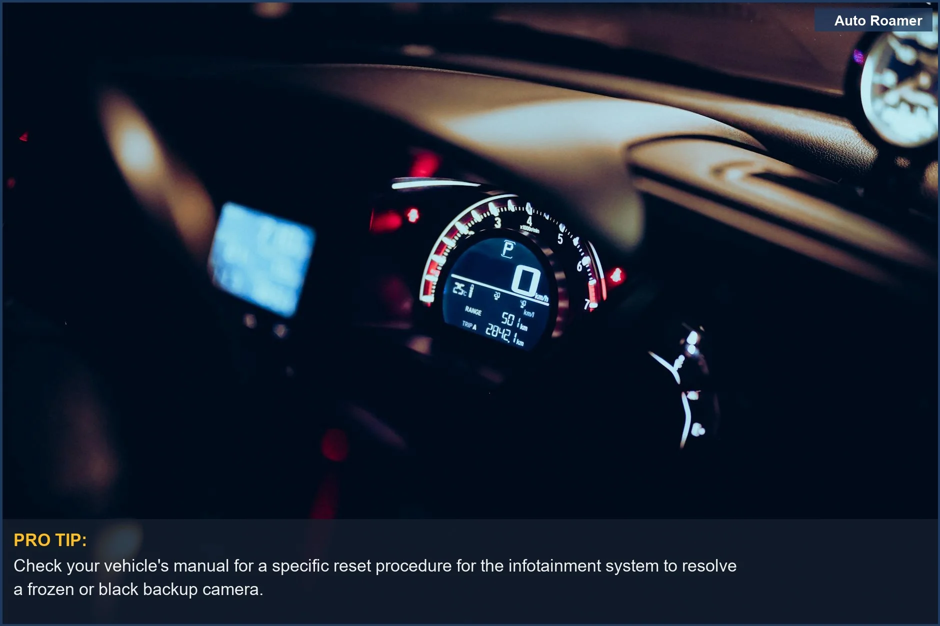 Close-up of a car dashboard at night, with illuminated speedometer and tech displays, representing the complex systems affected by a black backup camera.