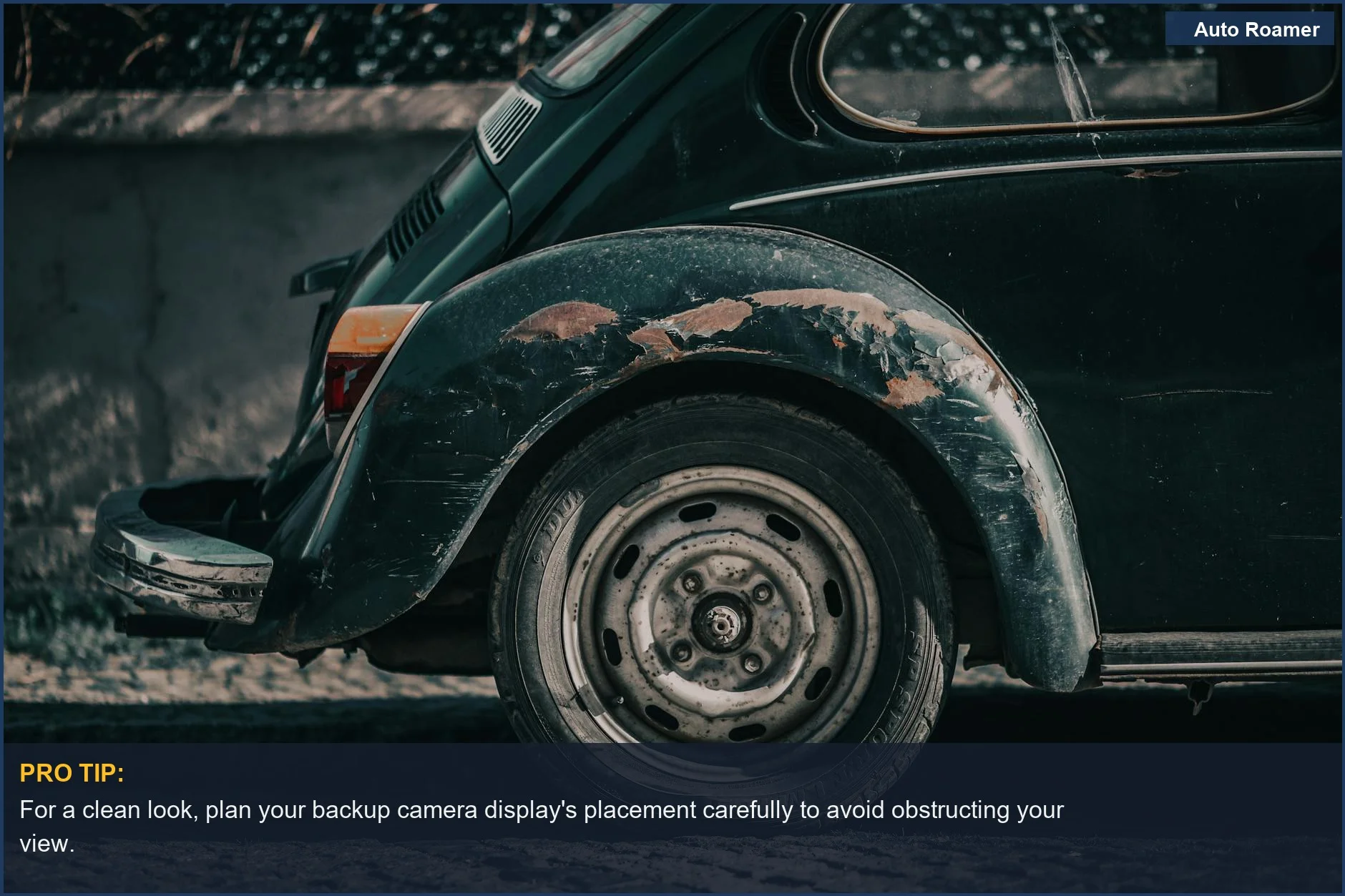 Close-up of a weathered classic Volkswagen Beetle, showcasing its nostalgic appeal and exterior details.