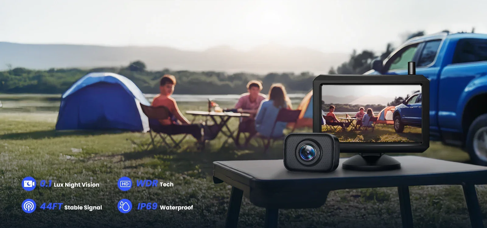 Wireless backup camera and its monitor set up on a table at a campsite