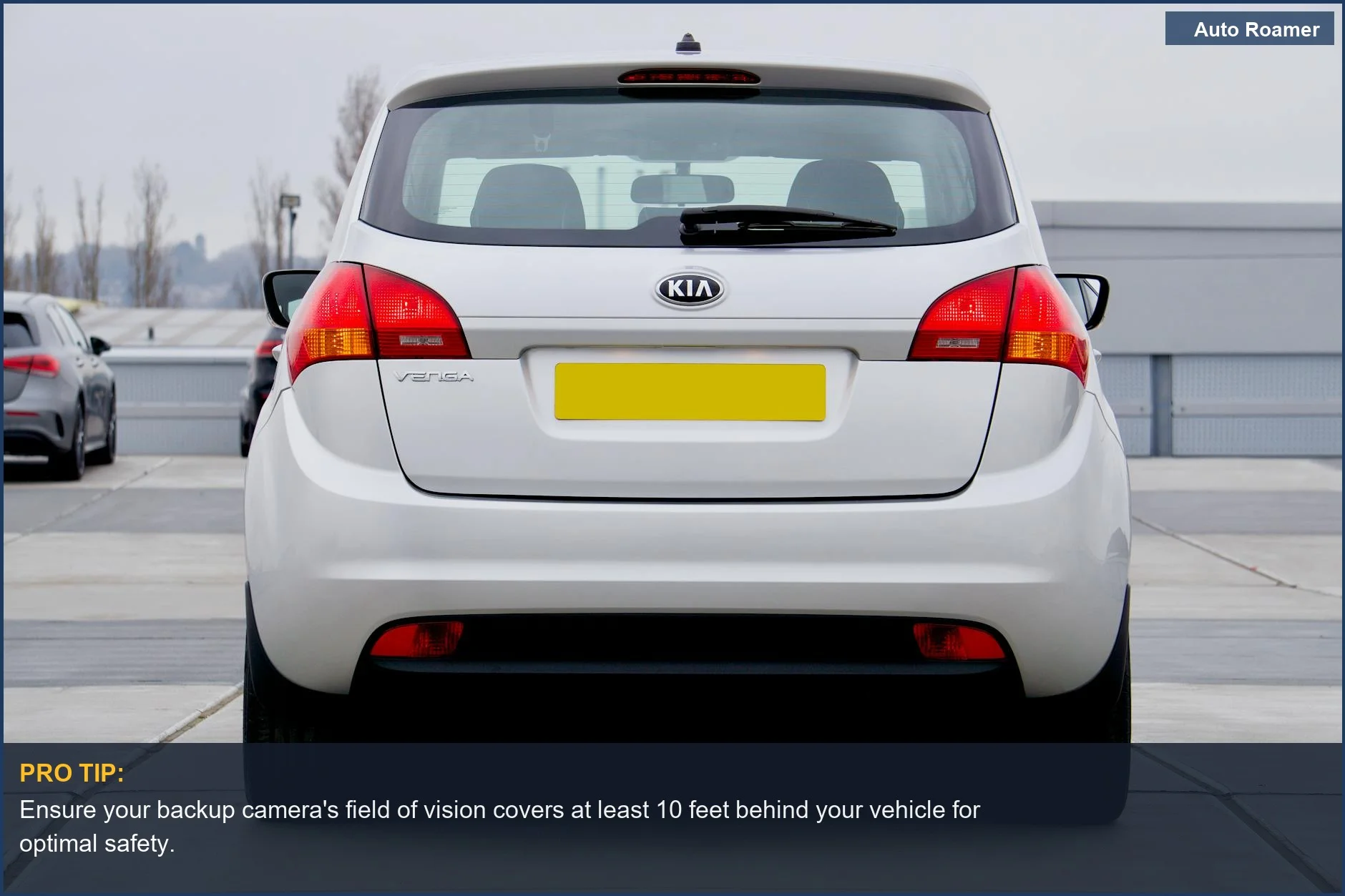 White Kia Venga hatchback rear view, demonstrating compliance with Canadian backup camera law for new vehicles.