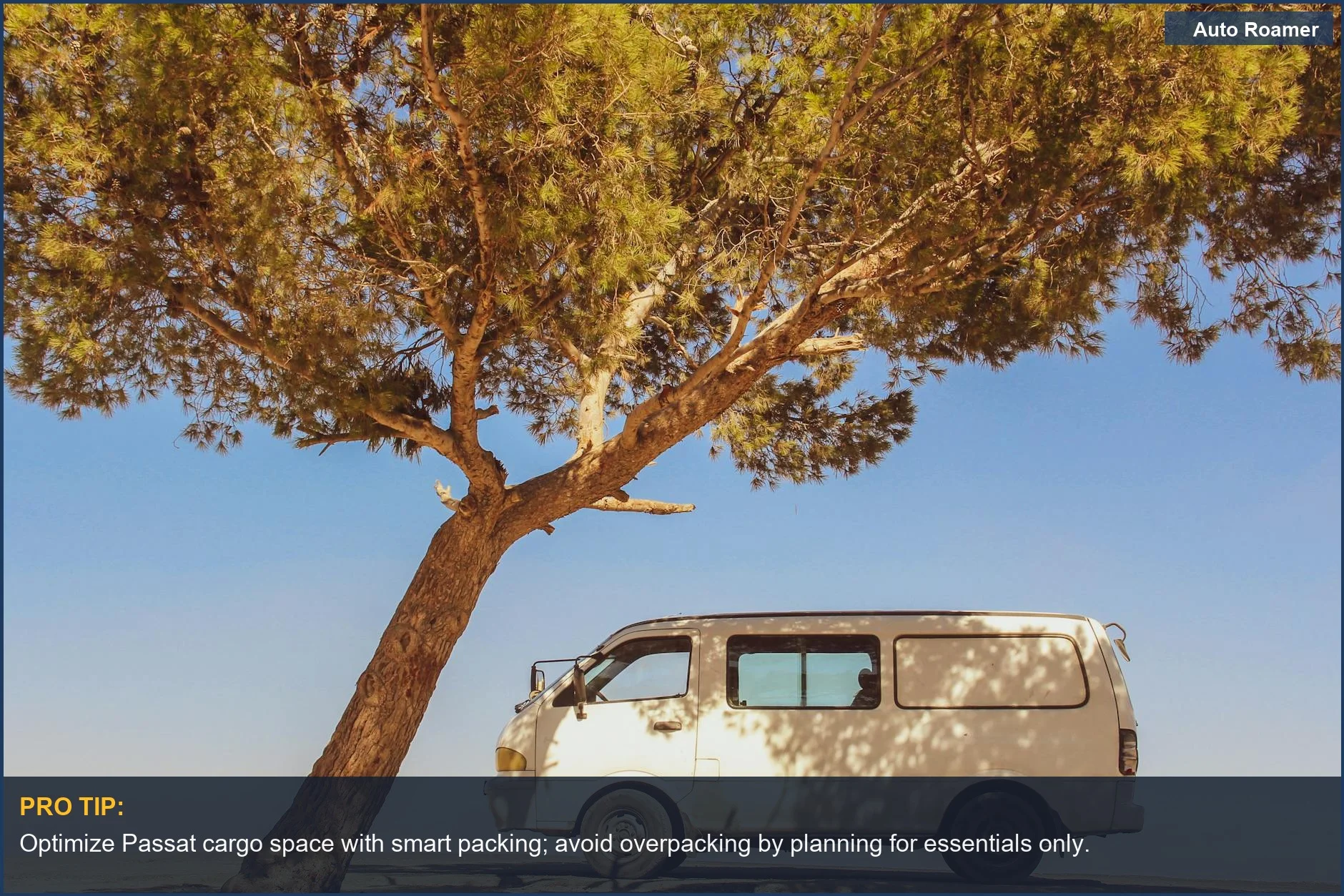 White Volkswagen Passat camper van parked under a tree, embodying peaceful outdoor travel.