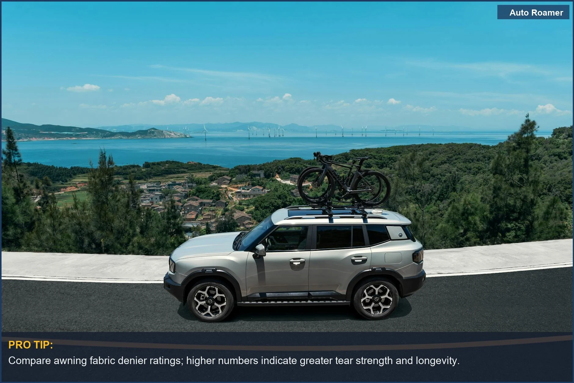 Silver SUV with roof rack bicycles drives coastal road, showcasing adventure travel.