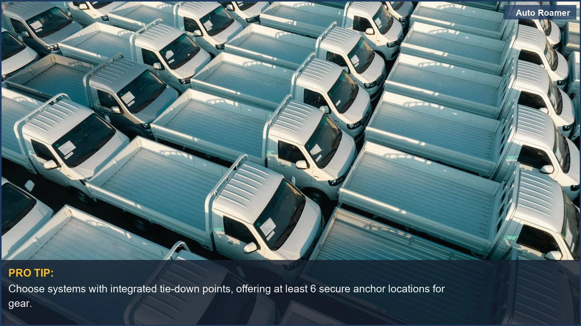 Symmetrical aerial view of white pickup trucks, underscoring the need for a well-engineered truck bed drawer system.