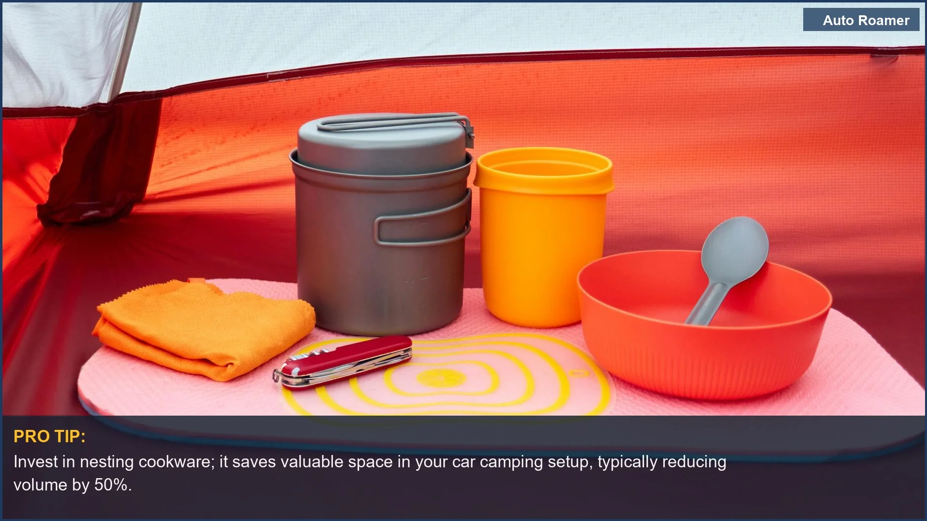 Organized colorful camping cookware and utensils inside a tent for practical car camping meal prep.