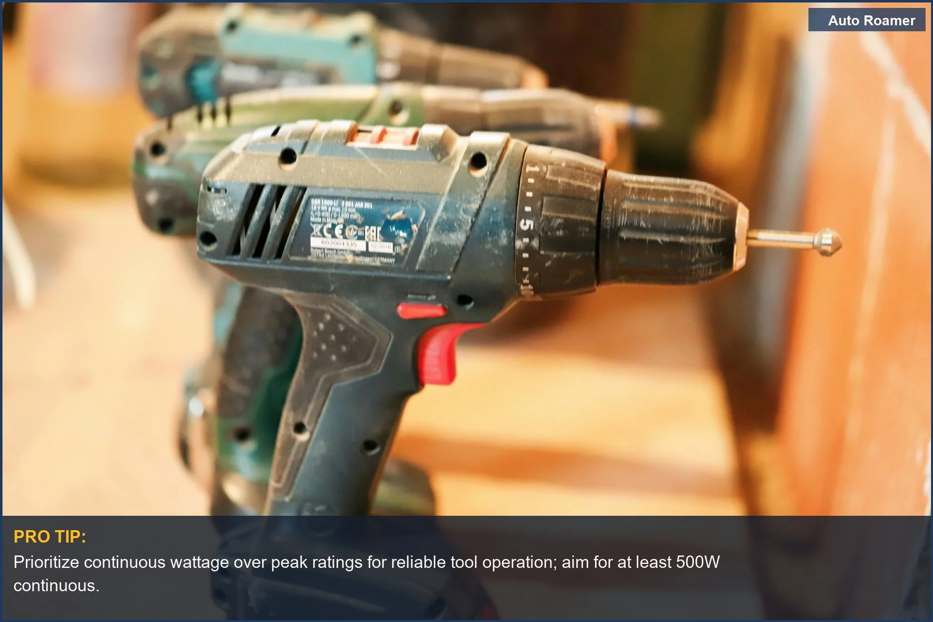 Cordless power drills lined up on a workbench, ideal for car camping inverter power tool needs.