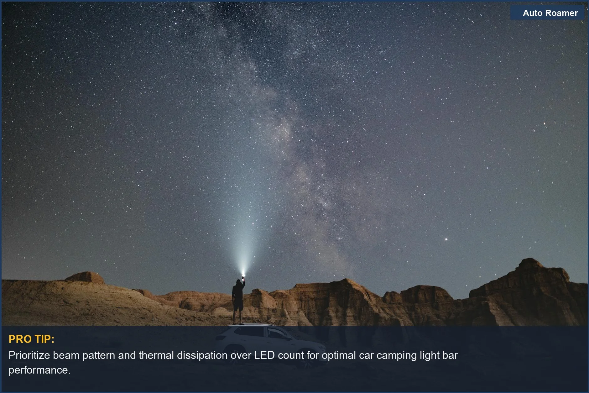 Adventure seeker with LED light bar near SUV under starry desert sky, showcasing best car camping lighting.