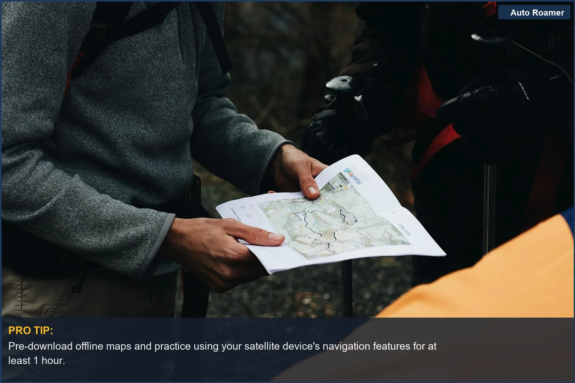 Hikers planning a route with a map exemplify the preparedness needed for using a car camping satellite communicator.