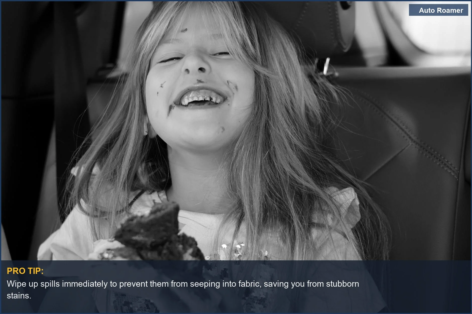 Happy child with chocolate on face enjoying cake in a car seat, emphasizing spill protection.