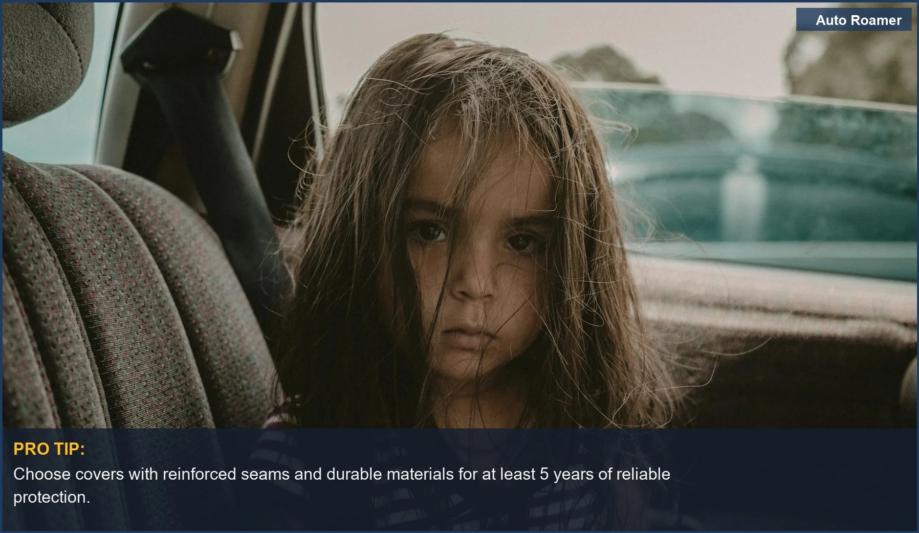Young girl with messy hair in a car seat, illustrating the importance of seat cover durability.