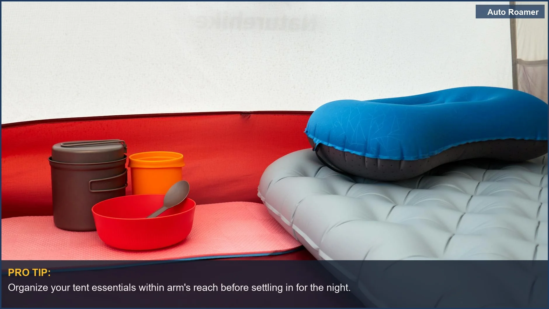 Inside a car camping tent showing an organized sleeping setup with pillow, pad, and cookware for a great night.