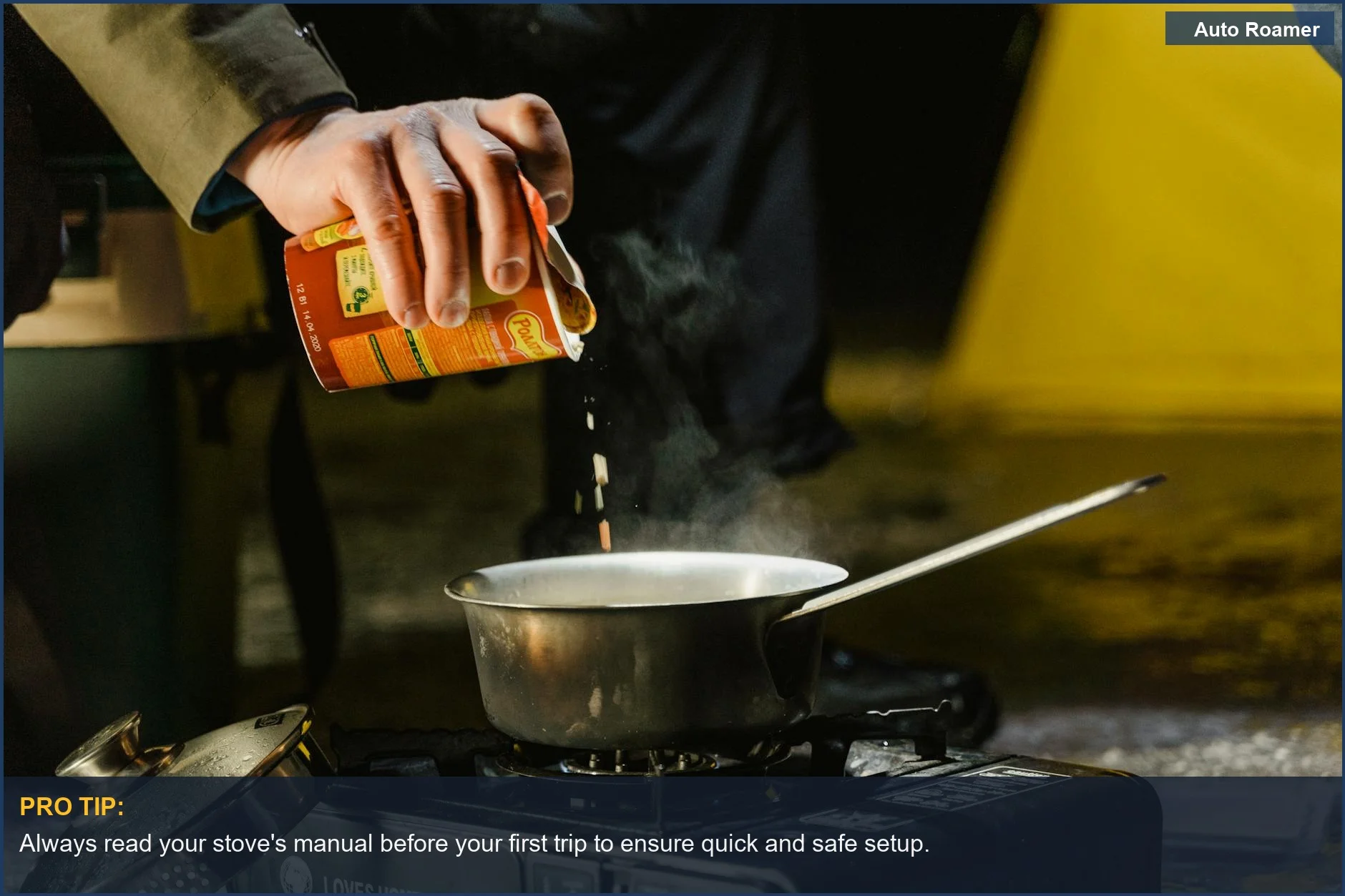 Hand pouring seasoning into a pot on an outdoor gas stove, simplifying beginner camp cooking.