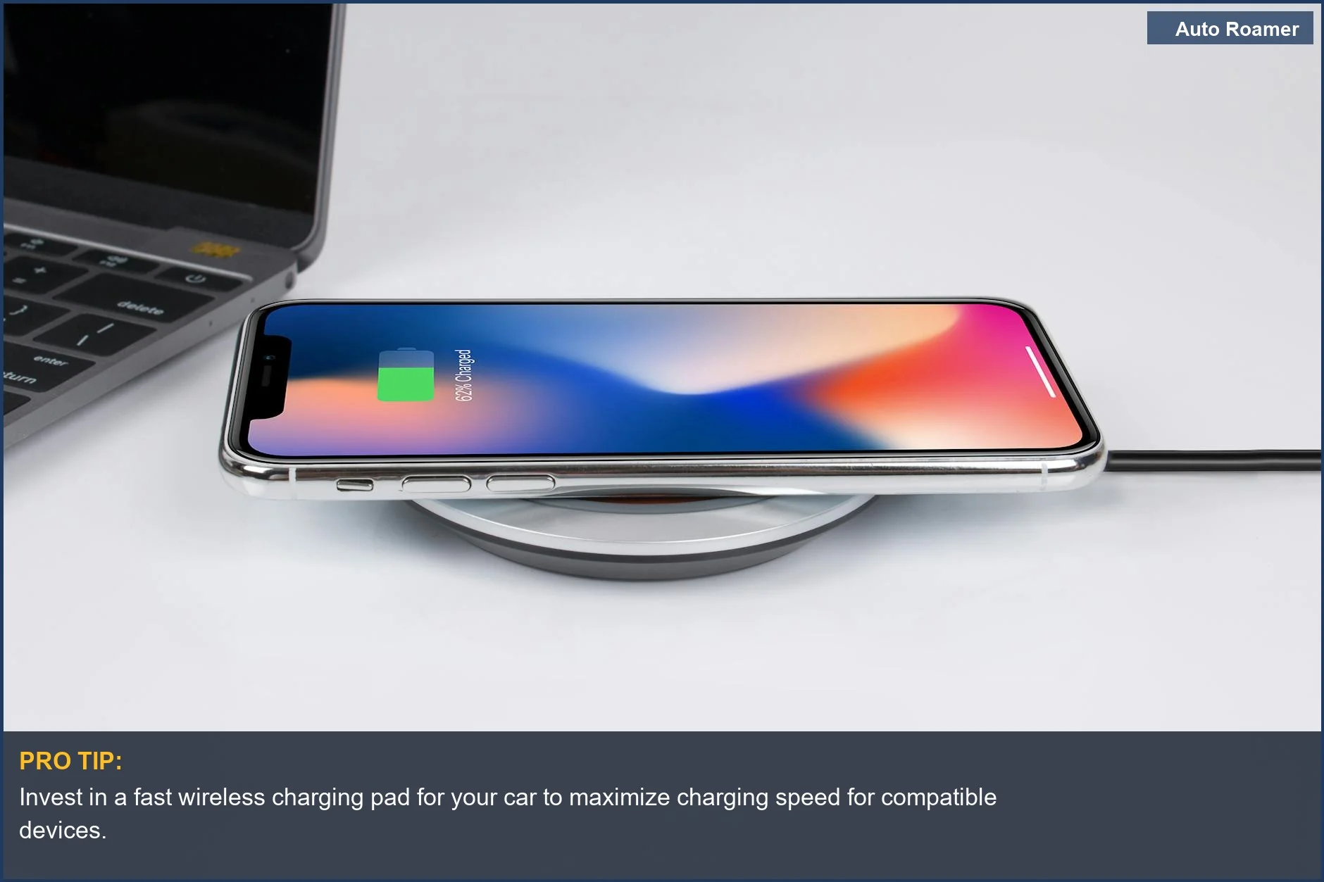 Modern car trip accessory showcasing a smartphone wirelessly charging next to a laptop.