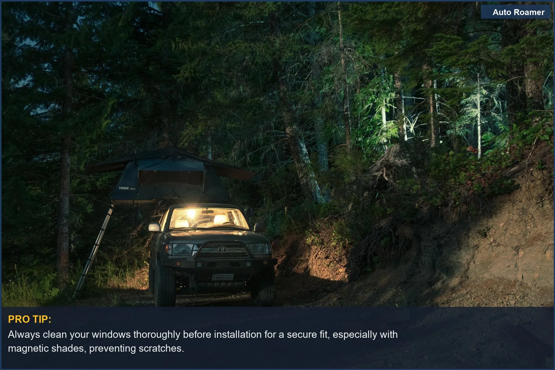 SUV with rooftop tent in a dimly lit forest campsite at night, emphasizing secure fit car window shades for camping.