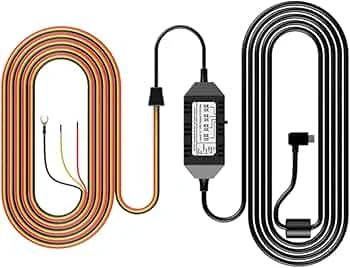 A dash cam hardwire kit coiled up with its inline step-down box