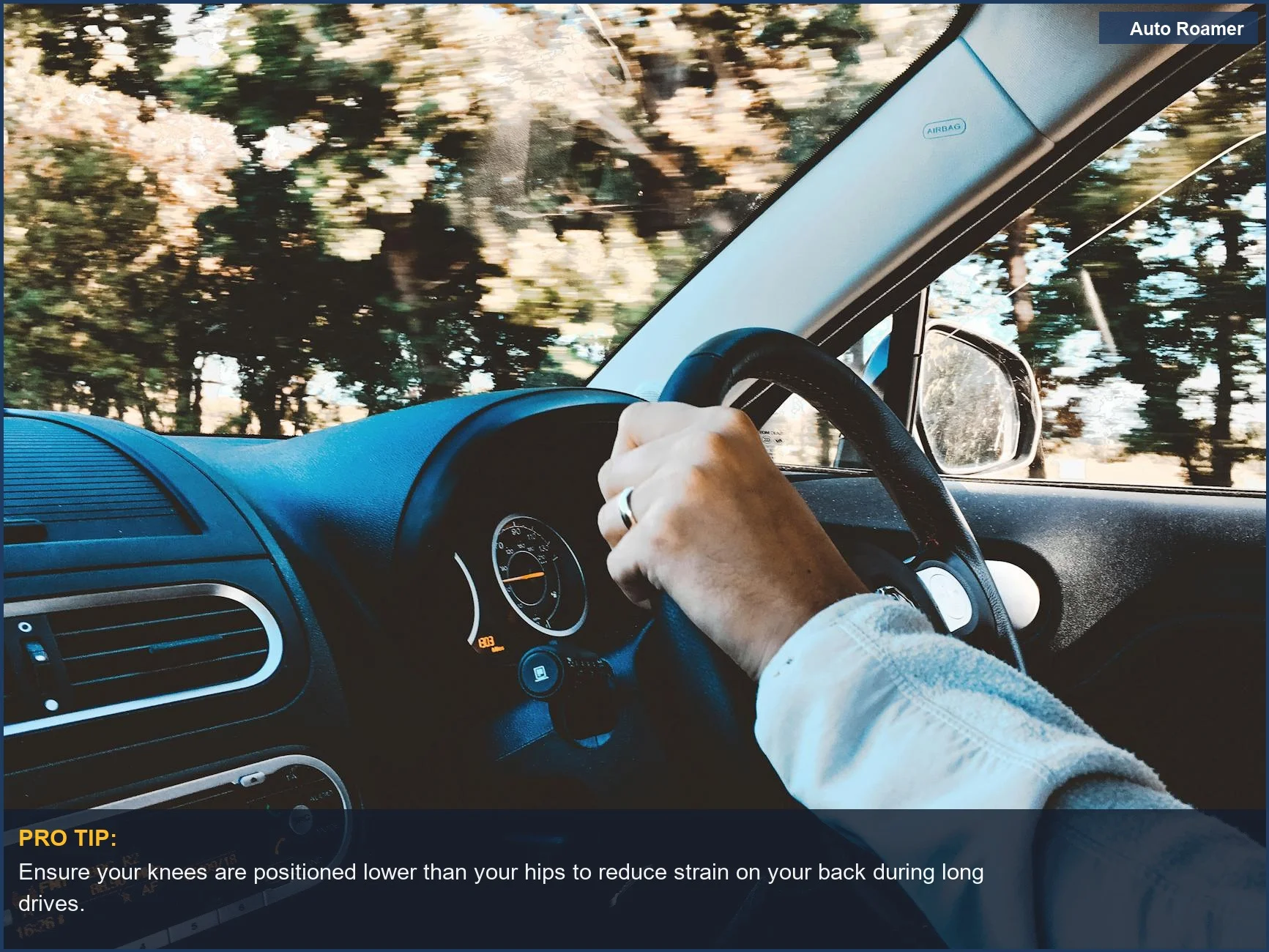 Driver's hand on steering wheel in a modern car, emphasizing knee position for comfortable long road trips and pain-free driving.