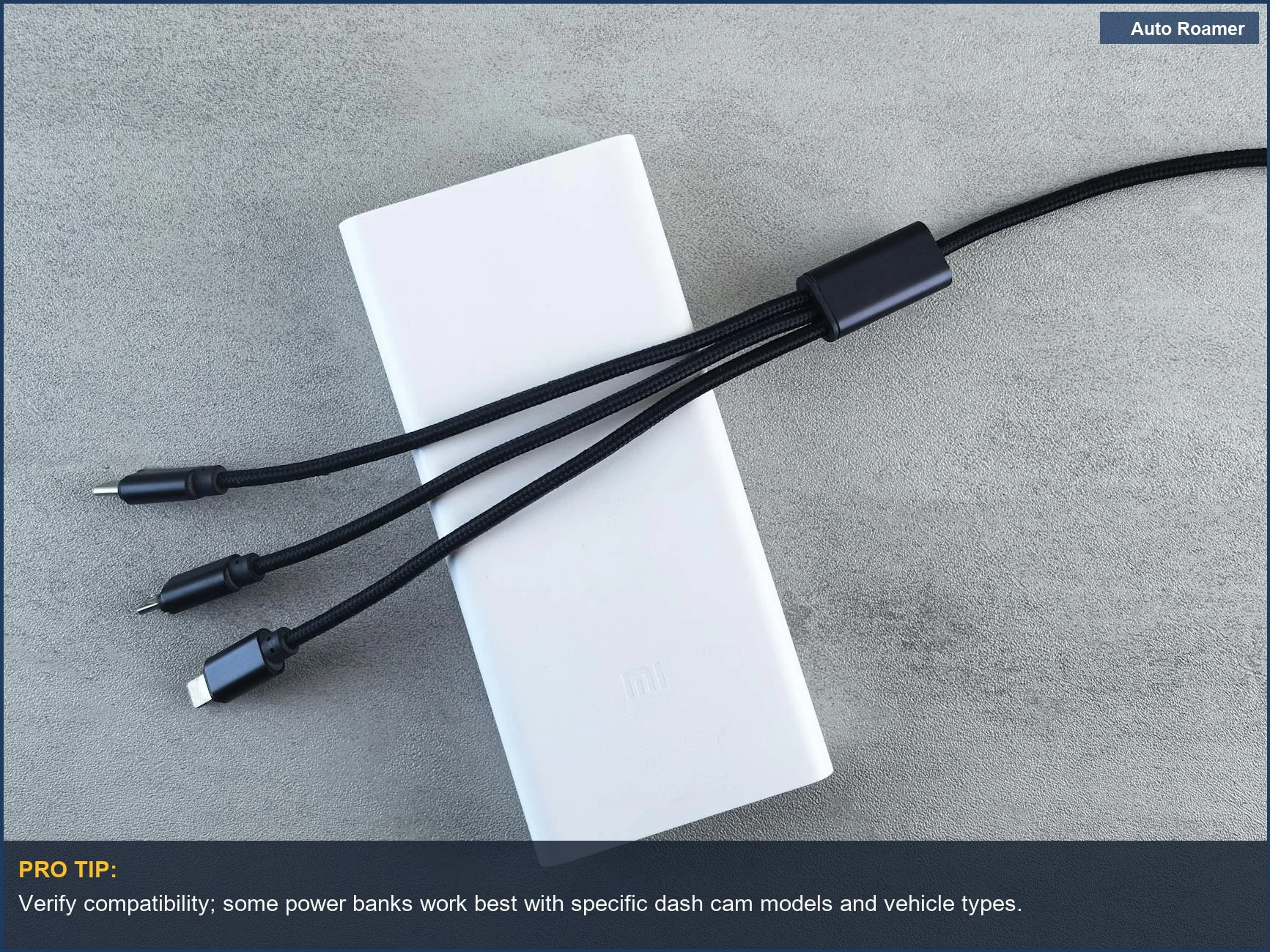 Modern white power bank with black cable, ideal for powering your dash cam's parking mode.