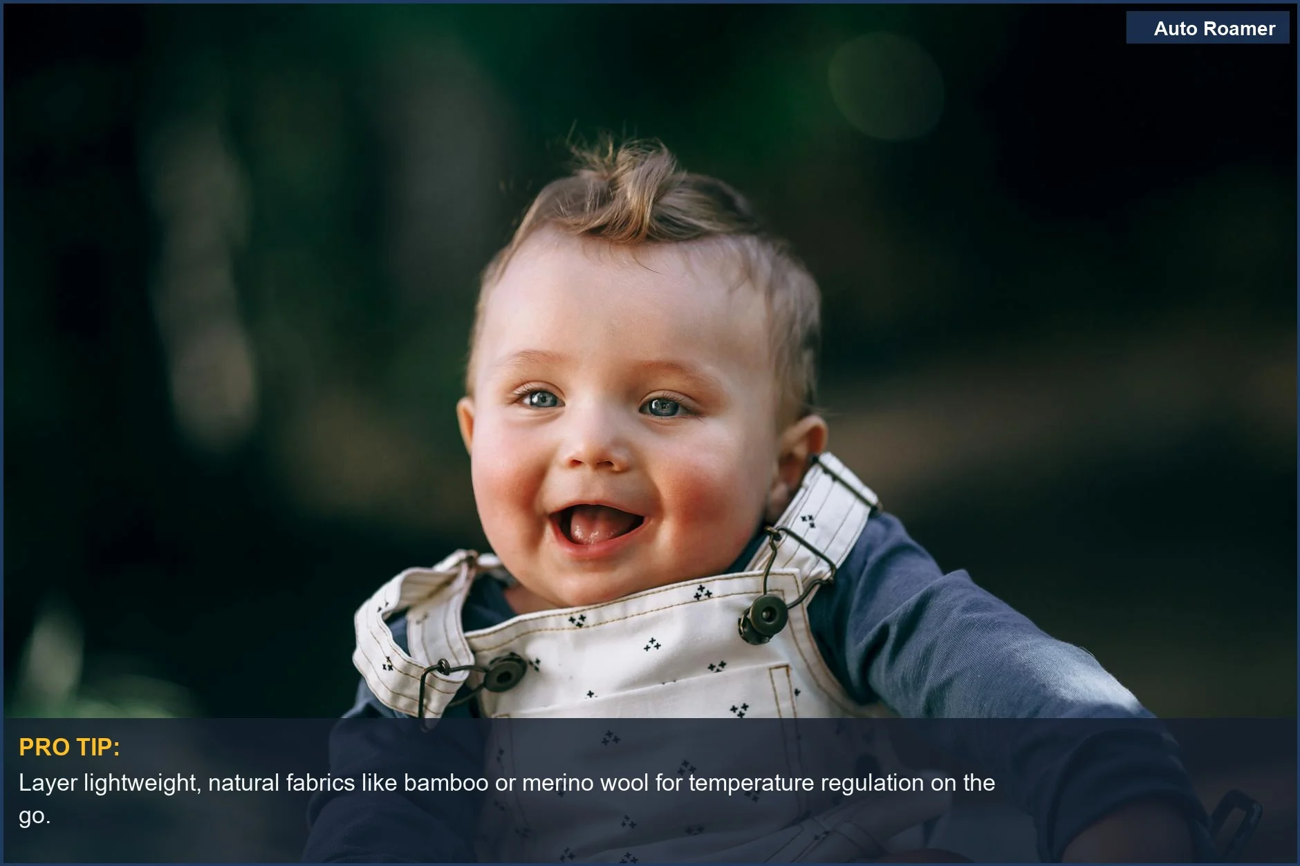 Adorable baby smiling in overalls, perfect for soft baby travel clothes fabric choices.