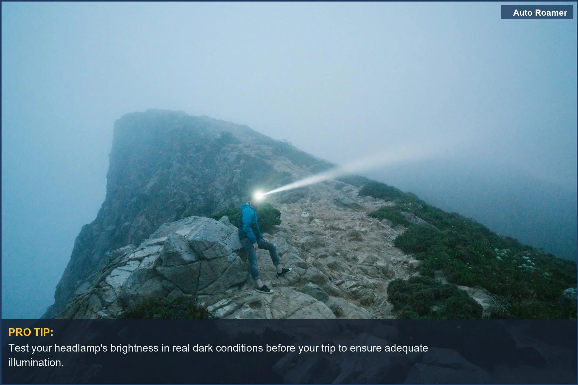 Adventurer using a bright headlamp for car camping on a foggy mountain path, highlighting visibility needs.