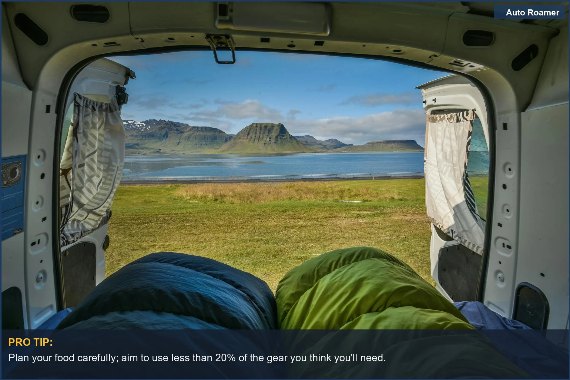 Scenic lake view from inside a camper van in Iceland.