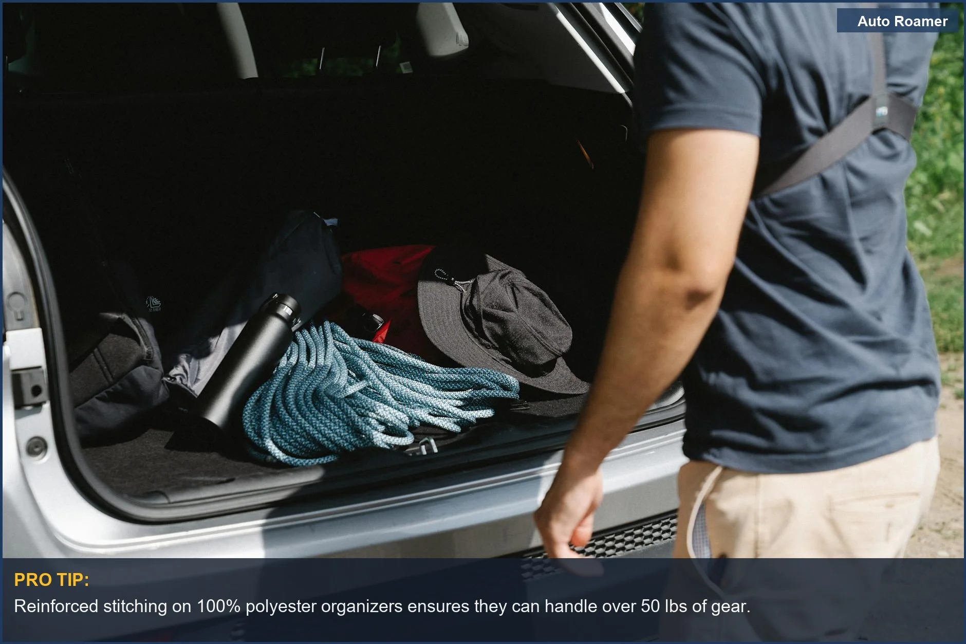 Man organizing heavy duty trunk organizer filled with camping gear for an adventure.