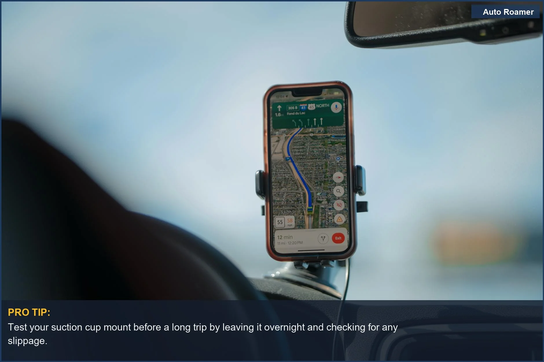 Smartphone with GPS navigation app mounted on a car dashboard, similar to a dash cam mount.