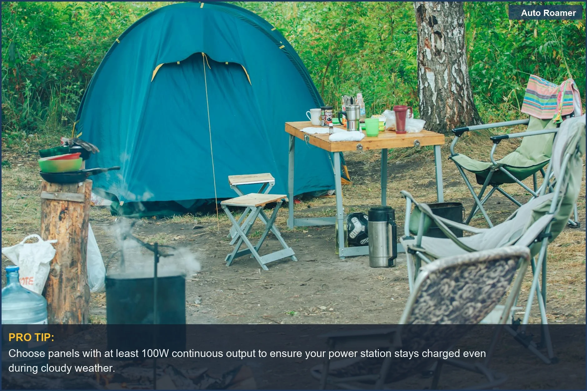 Serene campsite with tent and chairs, perfect for enjoying nature with a dependable solar power station.