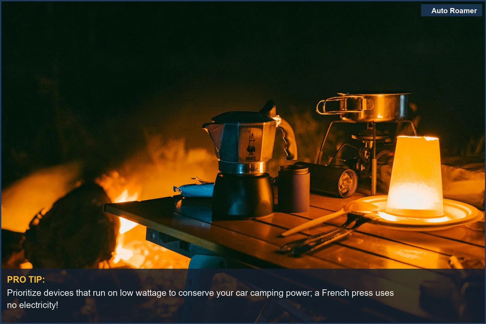Cozy campfire scene with coffee maker and cooking gear for essential car camping power needs.